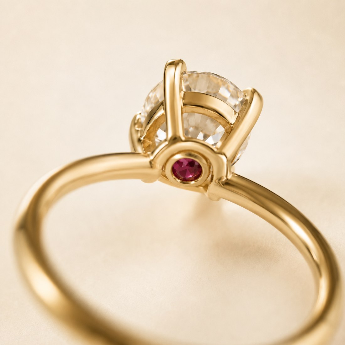 The Concealed Stone — a bezel-set ruby beneath the centre diamond