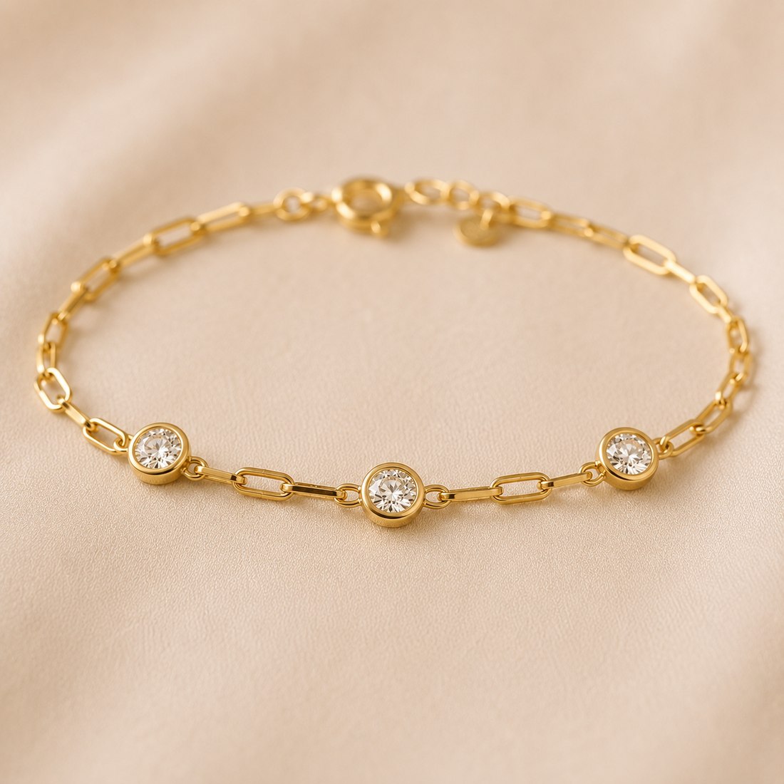 Paperclip-link bracelet with three bezel-set diamonds